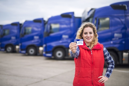 Woman Trucker Holding License