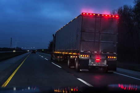 Truck on highway at dusk